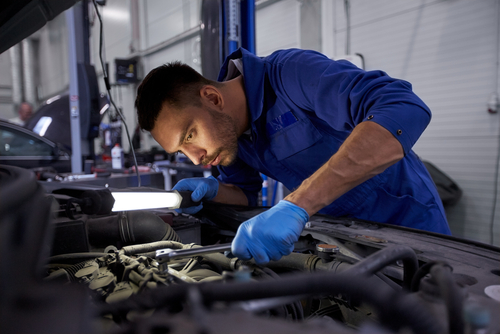 auto mechanic repairing a car