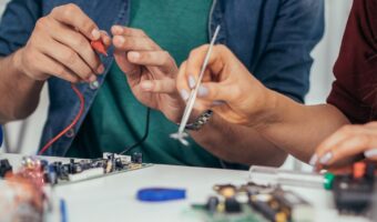 Students working on electrical circuits