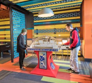 Students playing foosball