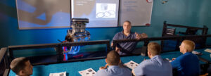 Derek Martel Teaching Automotive High Performance Class at New England Tech.