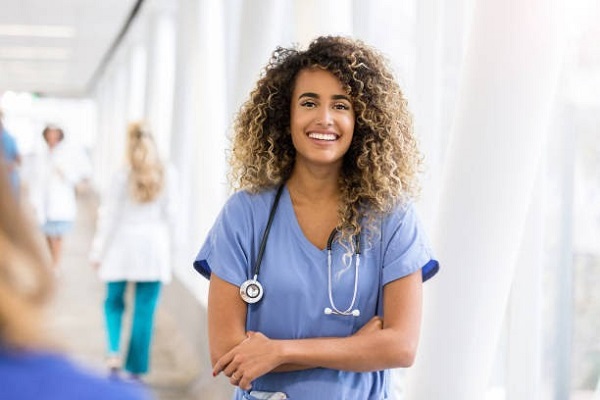 A smiling young female nurse