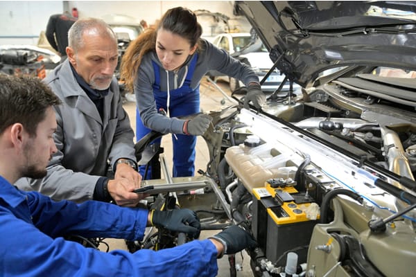 Automotive mechanics at work