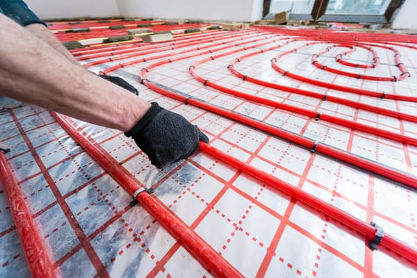 Plumber-pipefitter working on a pipeline