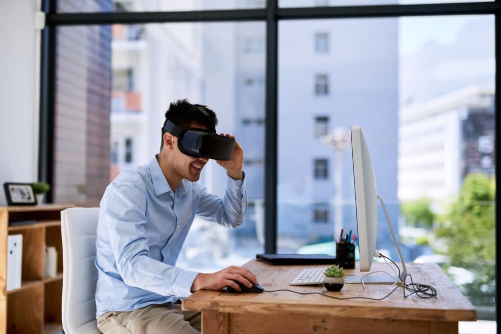 VR headset wearing young man