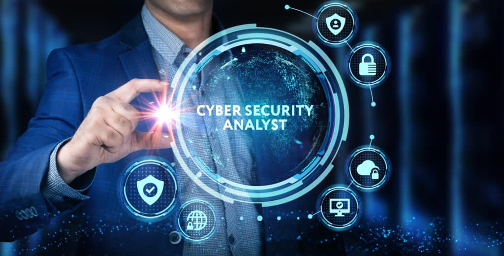 Young businessman selects the icon Cyber Security Analyst on the virtual display