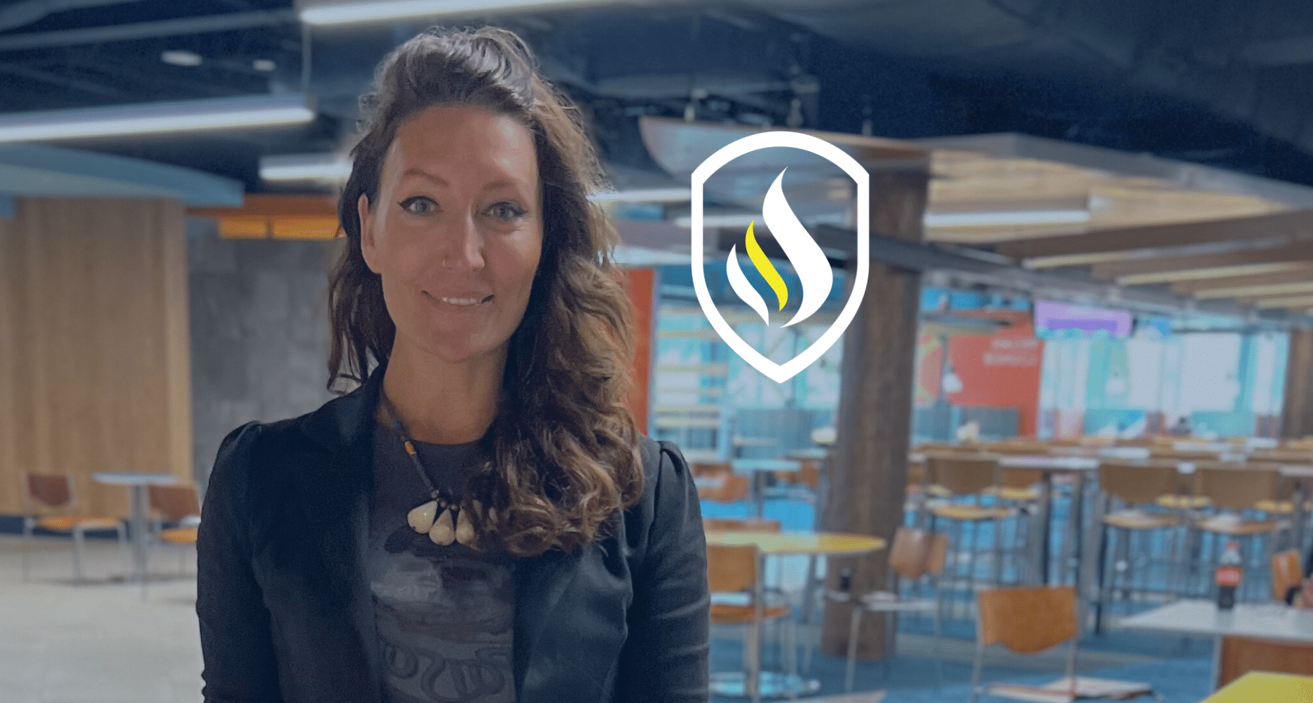 Jody Barna in front of classroom